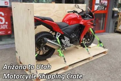 Red sport motorcycle strapped down on a wooden crate base, Arizona to Utah motorcycle shipping crate