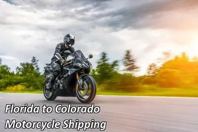 Rider on a dark cruiser motorcycle on an open road, Florida to Colorado motorcycle shipping
