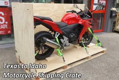 Red sport motorcycle strapped down on a wooden crate base, Texas to Idaho motorcycle shipping crate