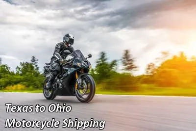 Rider on a dark cruiser motorcycle on an open road, Texas to Ohio motorcycle shipping